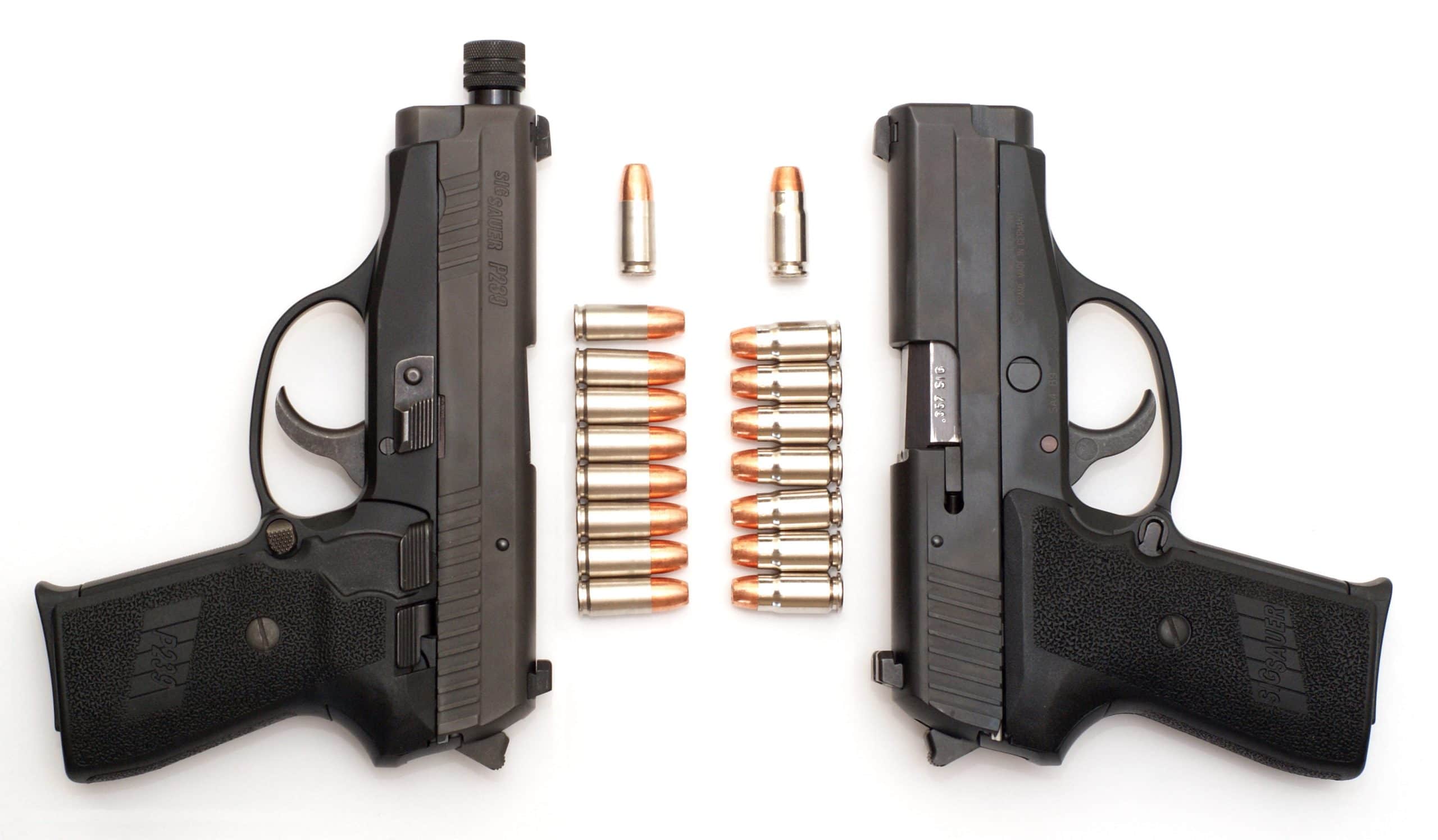 a picture of two sig p239s