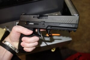 a picture of the SIG P320 Nitron at a gunshow