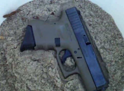 a picture of the Glock 26 Gen4 in mud
