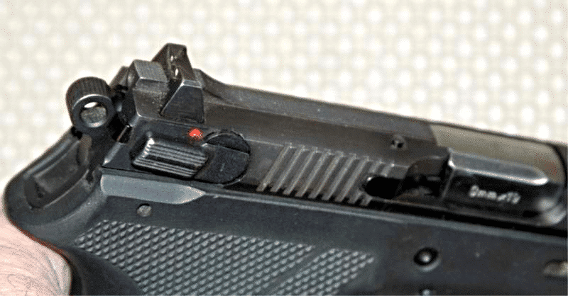 image of a 9mm pistol sight closeup
