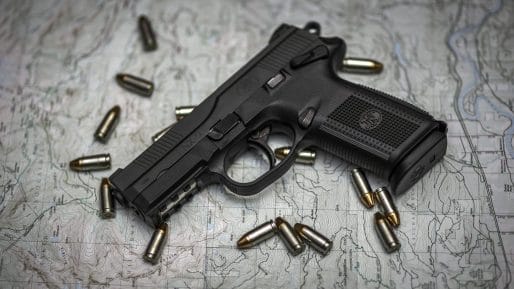The FN Herstal FNX-9 has an ergonomic polymer frame with a low-bore axis