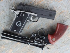Coonan 9mm semi automatic and a Colt Python revolver