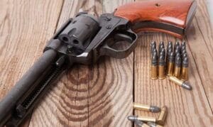 image of 22 lr single action revolver with ammo