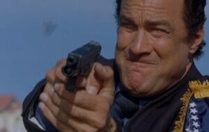 a picture of steven seagal holding a glock