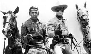 image of Lone Ranger and Tonto holding their revolvers