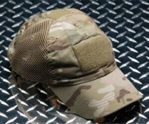 Tactical cap with camouflage and patch