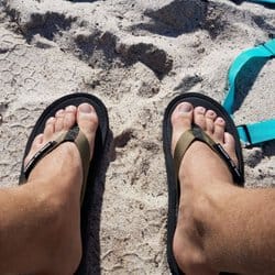 Wearing combat flip flops on the beach