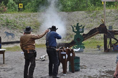 Cowboys at an Action Shooting Competition