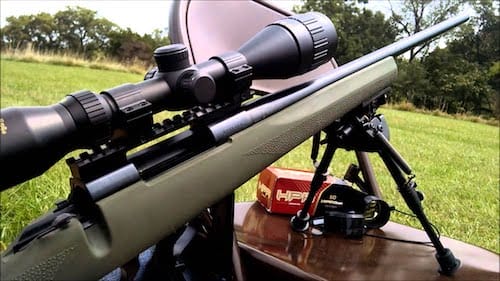 The Howa rifle with a scope outdoors