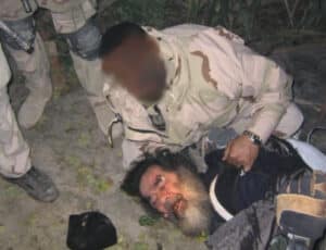 Saddam Captured with Glock 18
