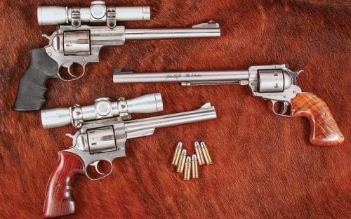 a picture of a Ruger Redhawk, Super Blackhawk and Super Redhawk in .44 Magnum next to each other