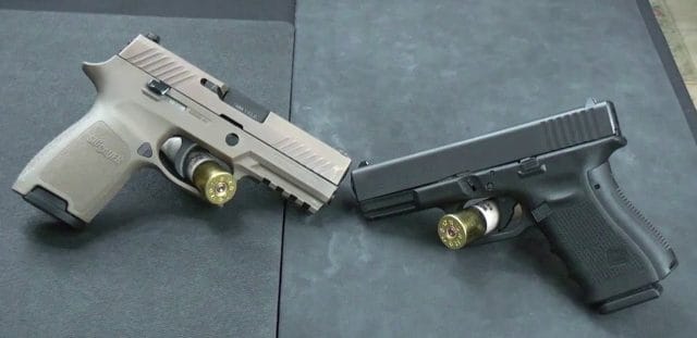 a picture of a SIG P320 and a Glock 31