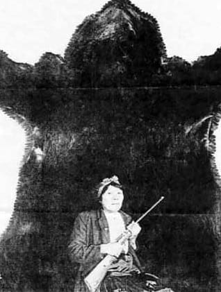 Bella Twin and the bear she killed with .22 Long