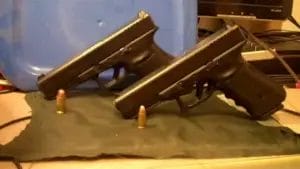 Glock 17 and a Glock 21 displayed side by side