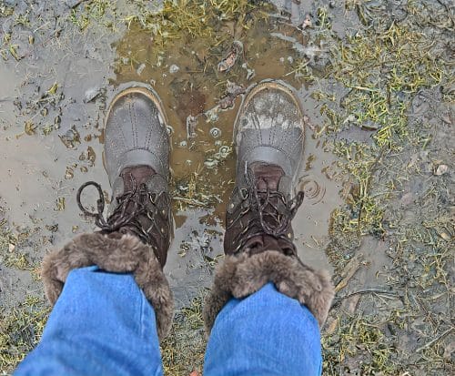 hunting boots waling in mud