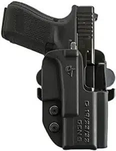 The Comp-Tac International Belt Holster Right Hand Beretta M9A1 is an outside the waistband (OWB) holster made of molded Kydex polymer