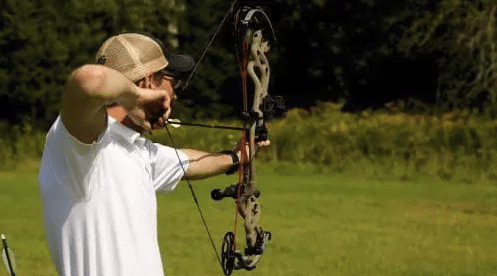 Shooting a compound Bow with Stabilizer. 