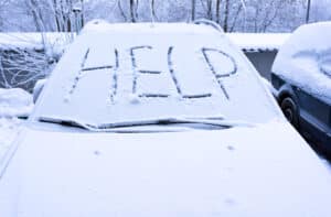 Car In Snow With Help