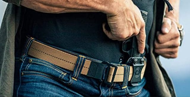 Wearing a tactical belt with holster